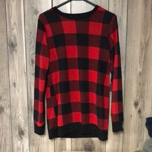 Women’s black and red top.